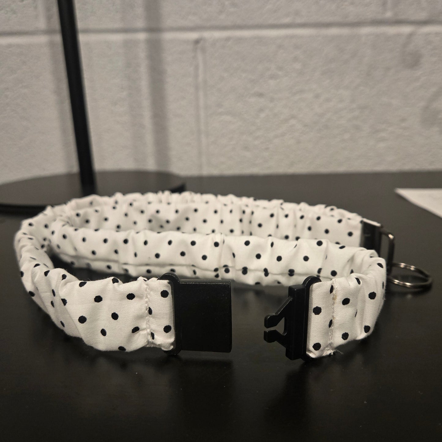 White with black polka dots