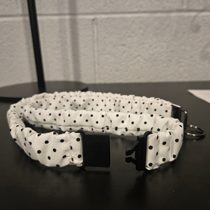 White with black polka dots